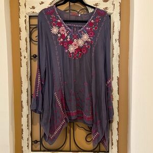 Johnny was gray tunic with flowers